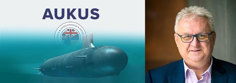 irector of Rubicon Associates, Goran Dubjlevic, portrait and a graphic representing the AUKUS nuclear-powered submarine program